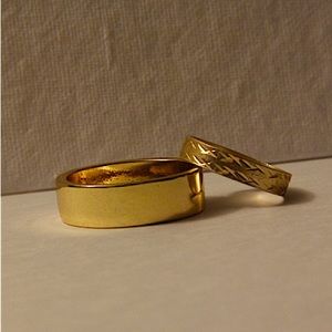 I am selling two gold colored rings, size 12 and 7 1/2